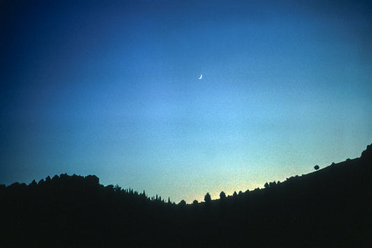 A sunset and the moon