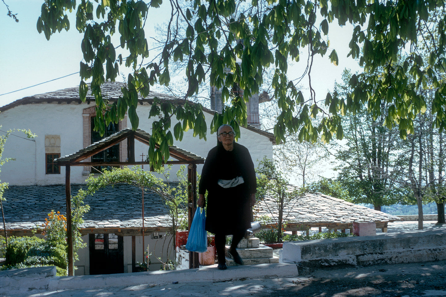 Pelion the church in Kissos and a local lady