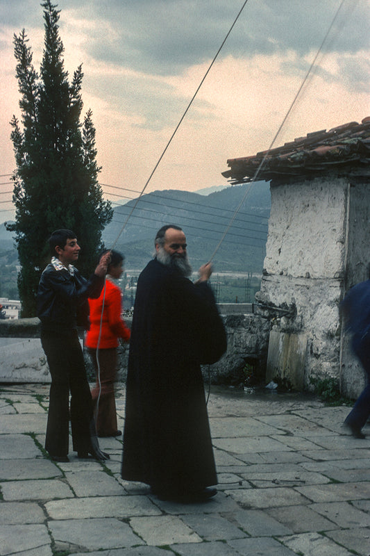 A smiling priest in Kalambaka