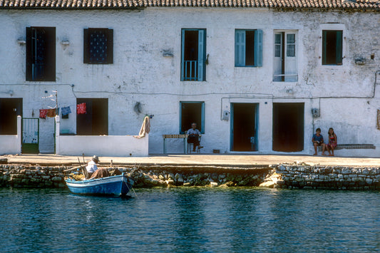 Lefkada the boat in front of a house in Vathi