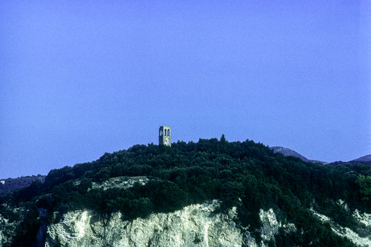 Driving towards Parga an old shrine on the hill