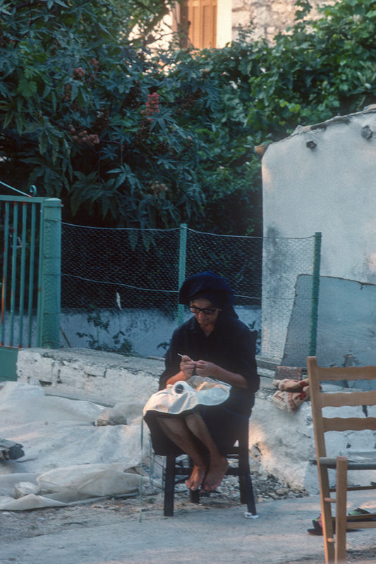 Lefkada, in Vathi, focused on her embroidery