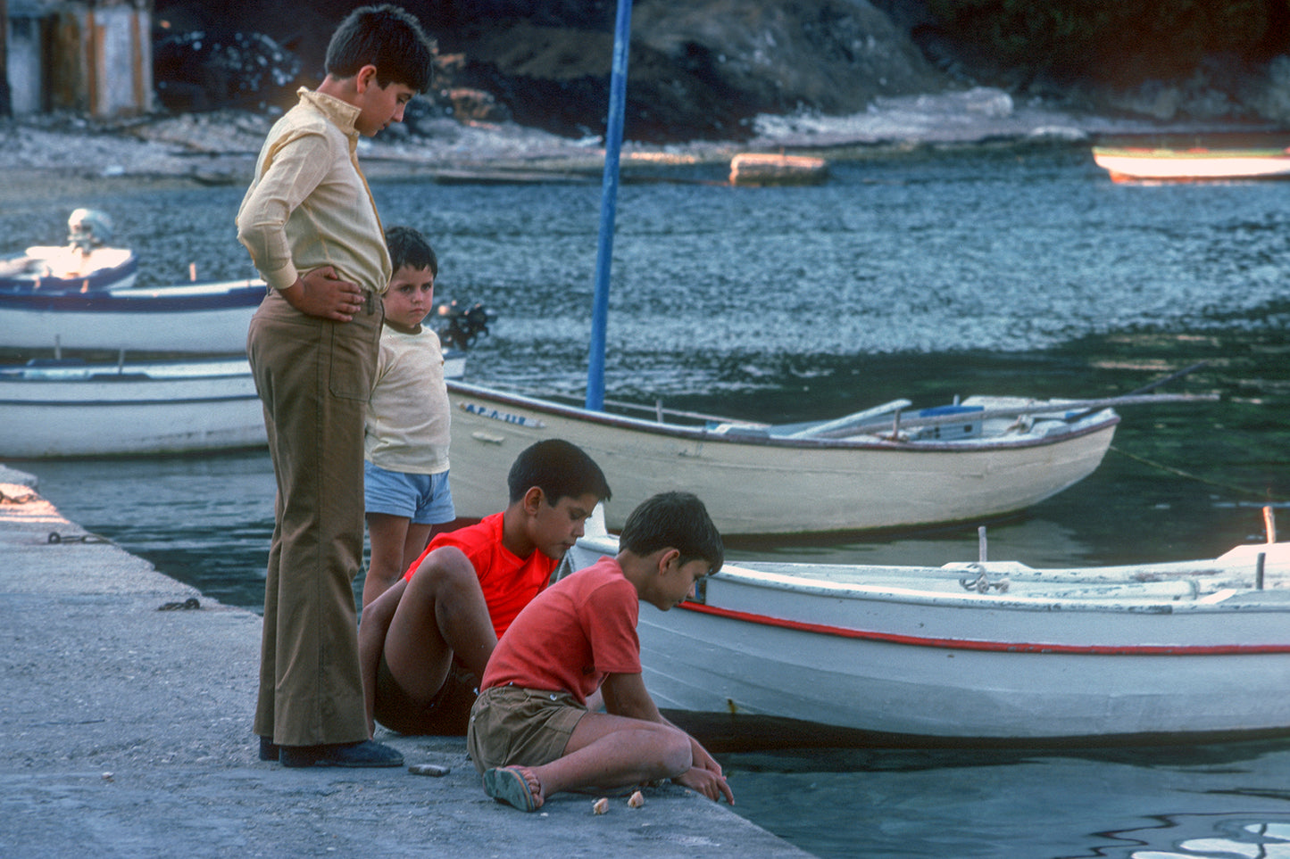 Kids fishing in Paxos