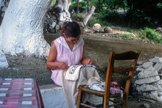 Samothrace: In Lakkomata the girl with her embroidery