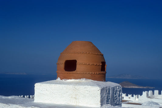 In Patmos a typical chimney hiding a bit the view from the Monastery