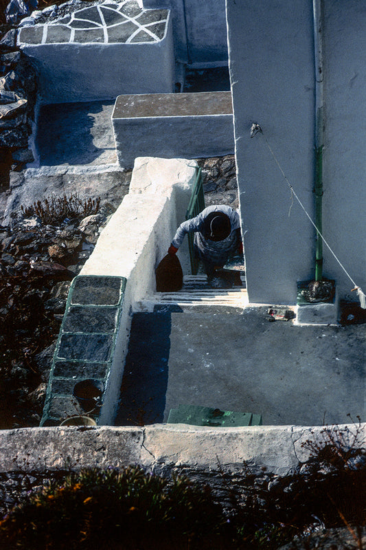 Serifos the lady sweeping in Chora