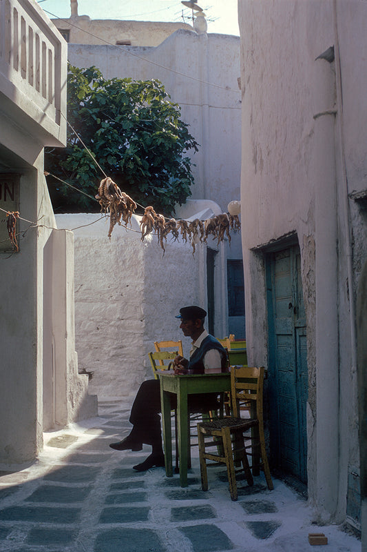 Drinking ouzo in Mykonos