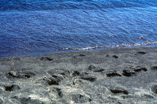 The black sand in Santorini