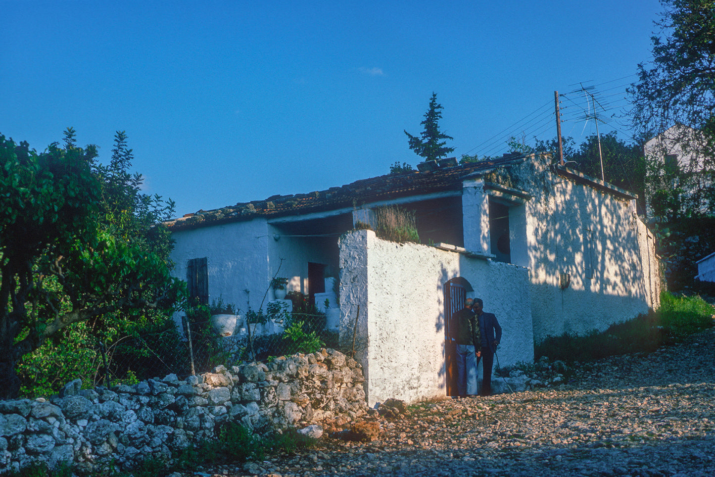 Crete, a chat in front of a house