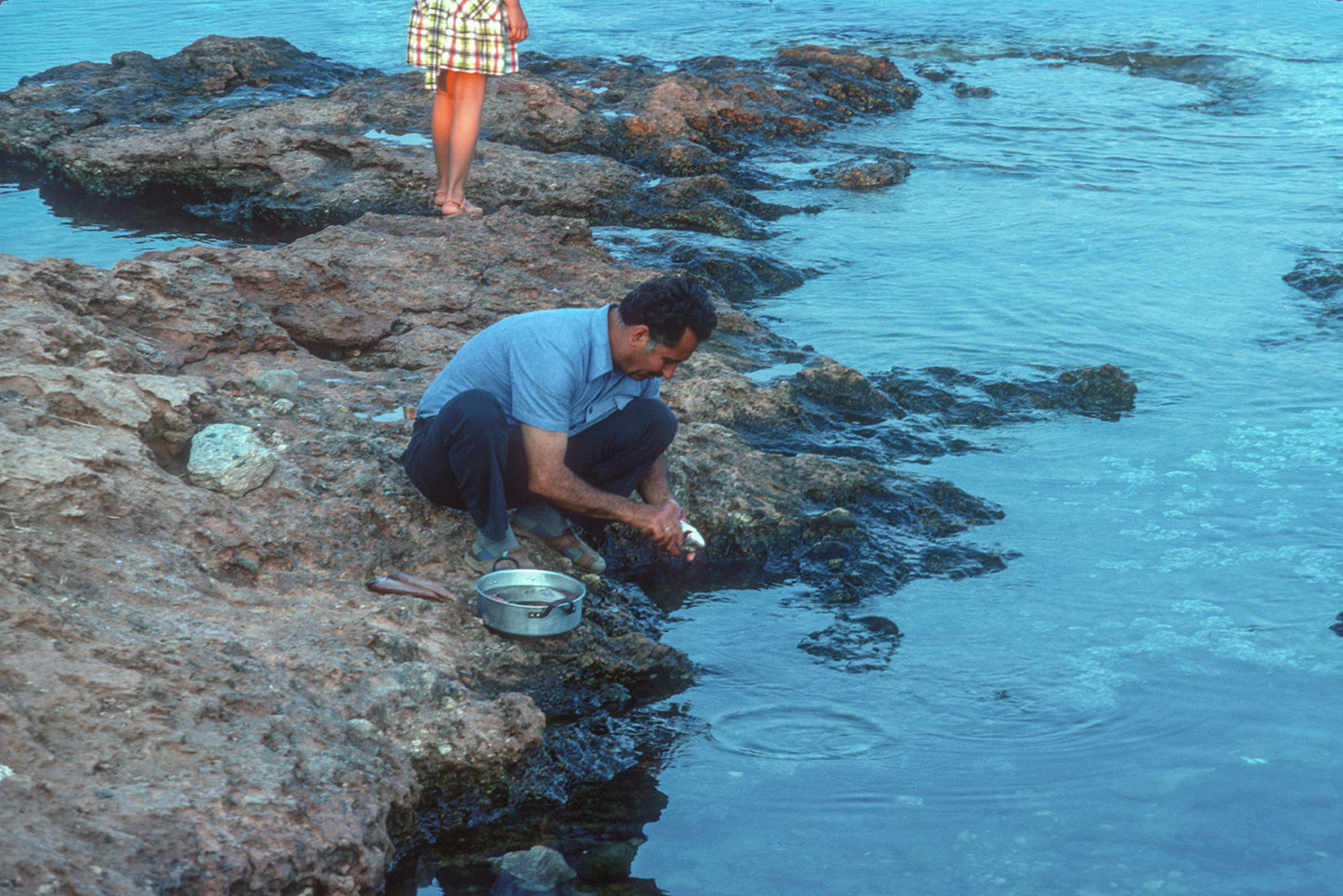 Crete, preparing a fish for cooking