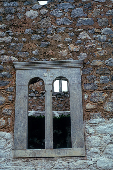 A window of a ruined building in Kipoula in Mani