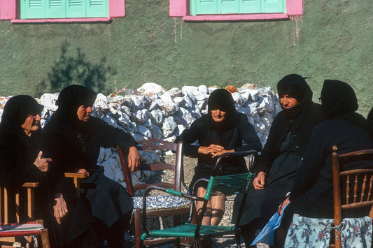 Chatting in the backyard in Mani