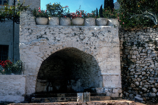 The pots and the fountain in the village of Lagada in Mani