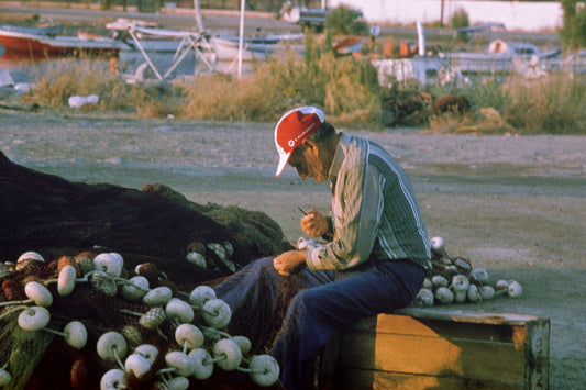 Repairing the fishing nets