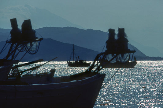 The fishing boats, the sea and mount Athos